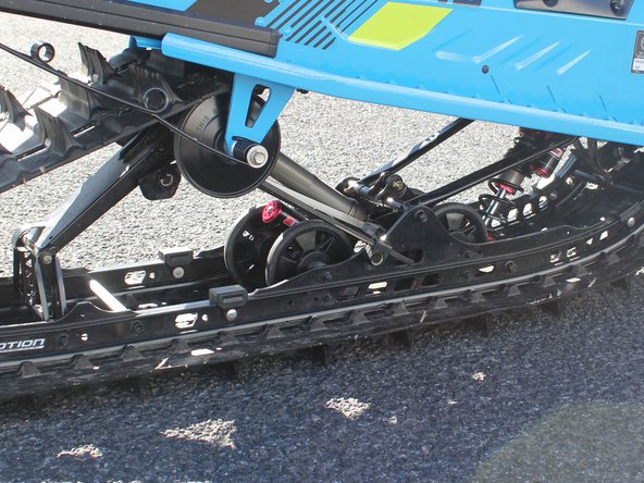 Re-install the two spring supports.