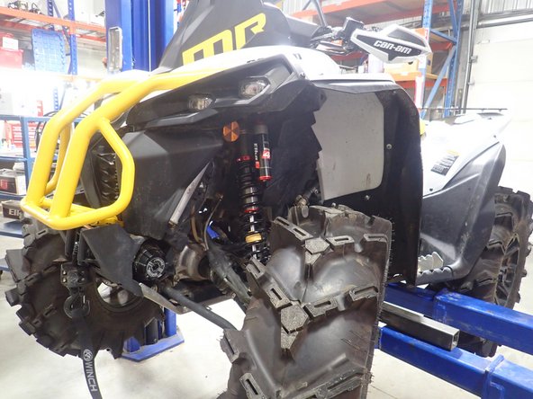 Install the front new Elka shocks with the reservoir ( on Stage 3-4-5 ) or Schraeder nitrogen valve ( on Stage 1-2 ) at the top of vehicle. ( left side shown ).