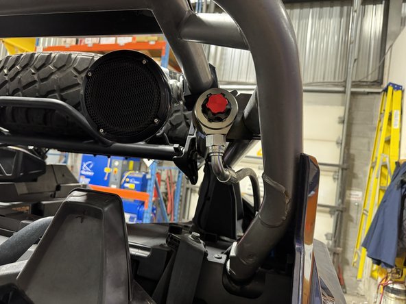 On the right side, make sure the hose clear the air intake as shown.