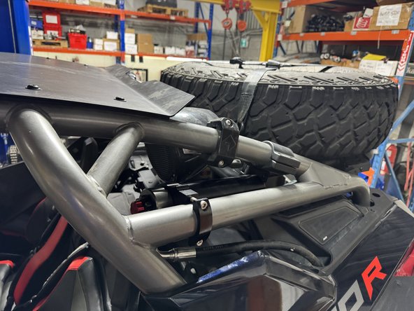 On the right side, make sure the hose clear the air intake as shown.