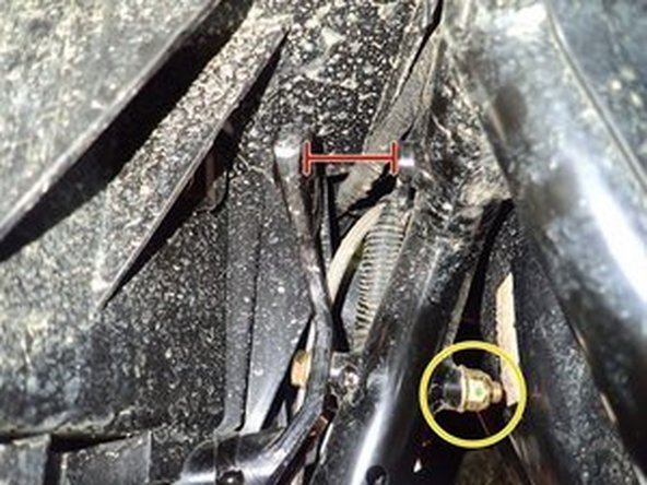 IMPORTANT NOTE: On certain models, upper bracket must be set away to install shock. You can loose the nut showed by yellow circle and pry bracket.