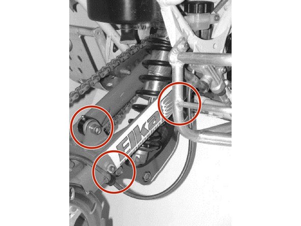 Grease the front pivot bolt and the black part of the Dual-Linkage using a grease gun on the zerks fittings.
