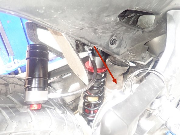 Lift the vehicle using a jack or stand so that the wheels are off the ground. Refer to your vehicle's owner manual for specific instructions on how to remove the stock shocks. Keep your original lower bolt to re-use when installing your new Elka shocks.