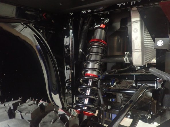 STAGE 1-2: Install the front new Elka shocks with the head oriented upward.