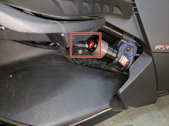 Install the reservoir in the OEM mounting bracket (provided for standard edition).  Put the provided rubber washer between the screw and the bracket (see blue circle). Make sure to not overtorque the screw.