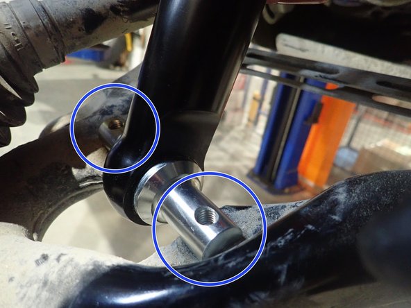 To install your new Elka shocks, do the inverse procedure showed on step 4. Shock reservoirs must face to the front of vehicle. You may have to push lower suspension arm to put the shocks in place. (Right side shown)