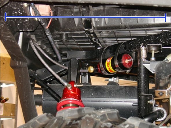 The compression adjustment knobs should be facing the top of the vehicule for convenient access.