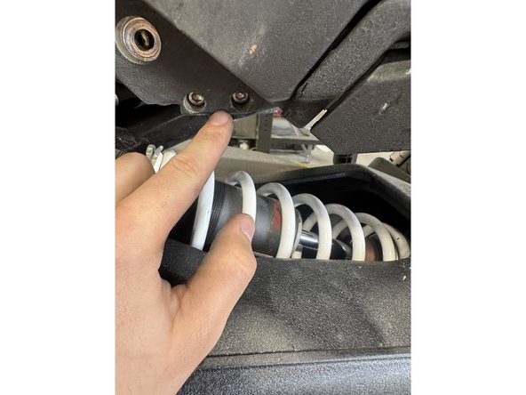 Remove the 4 bolts holding the support and remove the support.