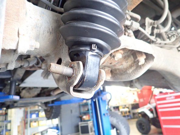 Install lower bolt first without tighten it now.