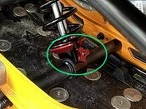 Reinstall the lower shaft on the center Elka shock in the reverse order it was remove.