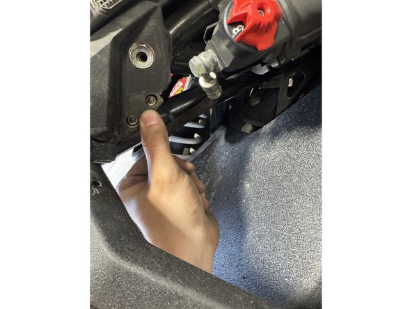 Remove the 4 bolts holding the support and remove the support.