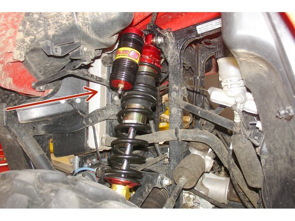 Install the Elka shock absorbers bolting the top mount first with the piggyback reservoirs towards the outside of the vehicule.