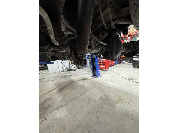 Remove upper and lower bolts from OEM shocks. Keep OEM bolts to install Elka shocks.