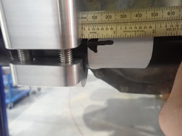 Slide clamp assembly from 1/16" to 1/4", so as to compress stabilizer, then torque clamp's socket head bolts in criss-cross pattern at 60 Ft/Lb.