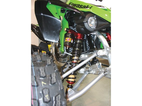 Lift the vehicle off the ground with a jack or on a stand. Remove the stock shock absorbers from the vehicle (refer to the manufacturer’s documentation).