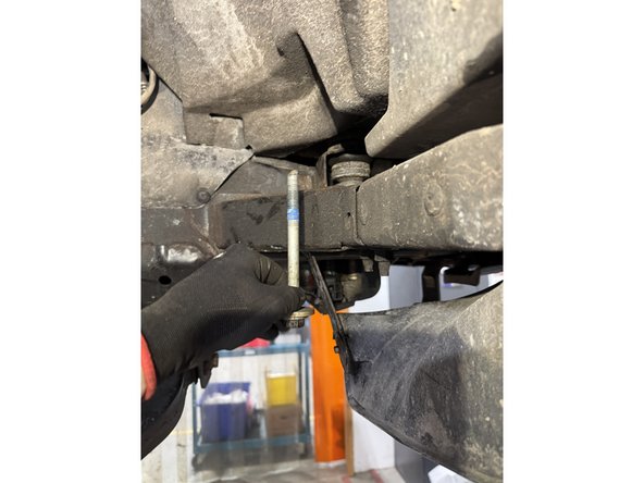 Remove the bolt that hold the front cab support, on both sides.