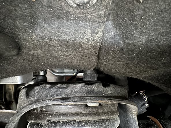 Remove the 3 nuts of the upper shock.