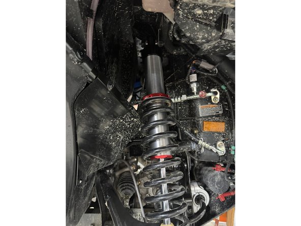 Install the IFP shock with the head upward.
