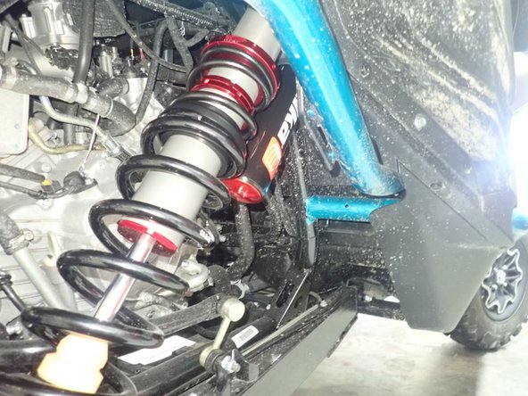 Install the new Elka rear shocks with the piggyback reservoir facing the ground and oriented towards the front of the vehicle as shown. (right side shown)