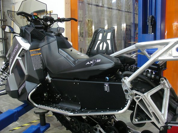 Remove the seat and the aluminium rack.