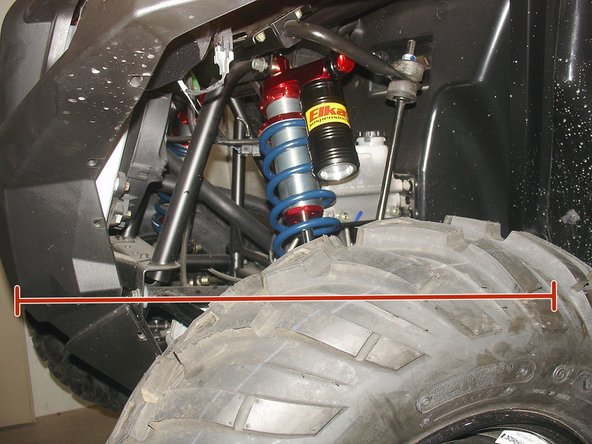 Remove the stock shocks. Refer to the vehicle’s owner manual if needed.