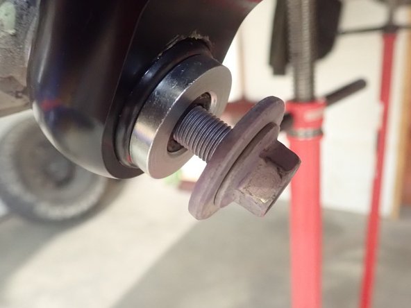 Make sure the lower stud is free of rust, clean it if necessary.