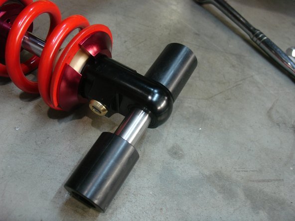 On Stage 4 and 5 , the shock must be installed with the hose fitting facing the rear of vehicle,so the hose going to the right side.