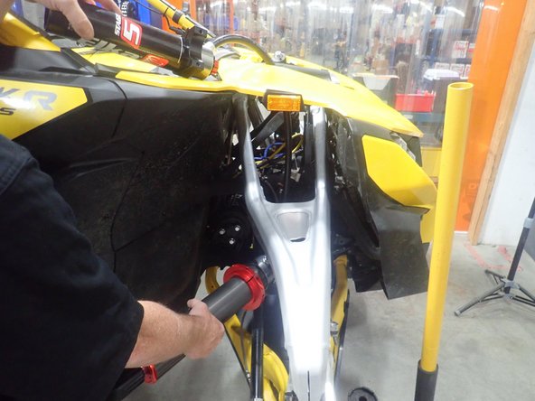 Install front remote reservoir shocks with the hoses facing the outside of vehicle, and facing rear of vehicle. (Right side shown).