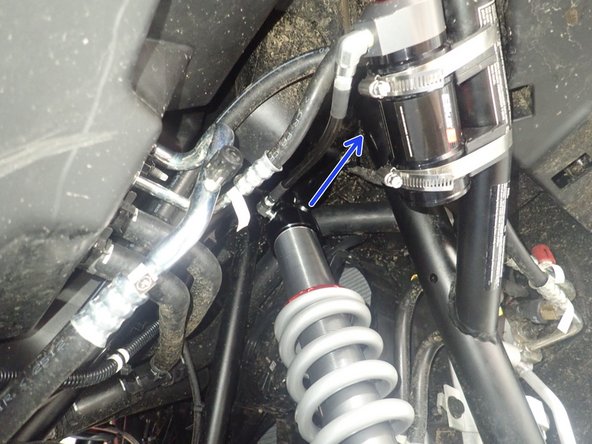 Note: The hose configurations are different on the left and right side, pay attention to pictures to make sure you are installing the proper shocks on each side.