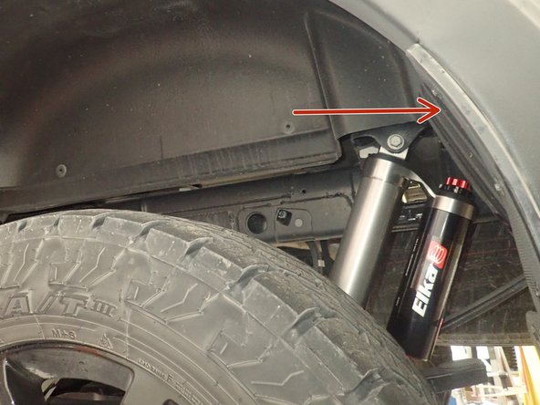 Lift the vehicle off the ground, then remove the oem shocks.