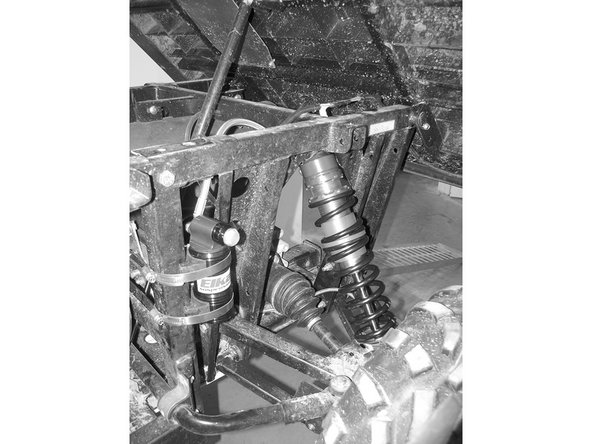 Reservoirs must be attached to the rear subframe using the provided rubber holders and metal collars. Make sure to route the hoses according to the pictures. You will need to attach the hose to the frame using zip ties.