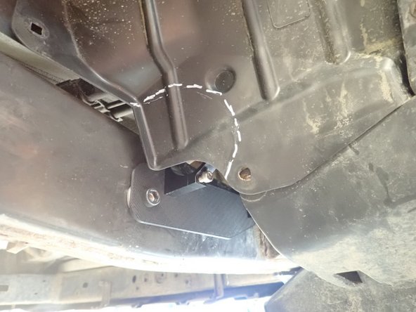 For the left side of vehicle, the Wheel liner should be cut to allow space for reservoir as shown by the dotted line on picture.