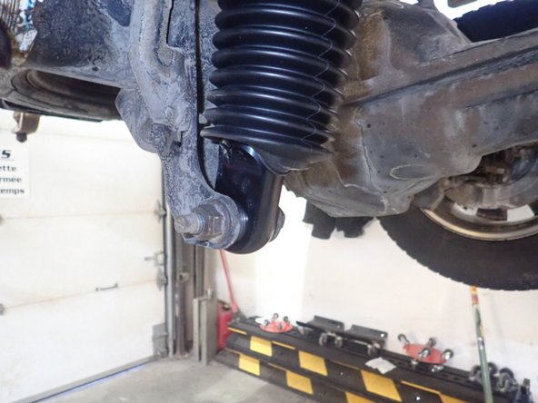 Slide second o-ring, then second provided spacer on stud. Install OEM nut on stud and torque it at OEM specs.