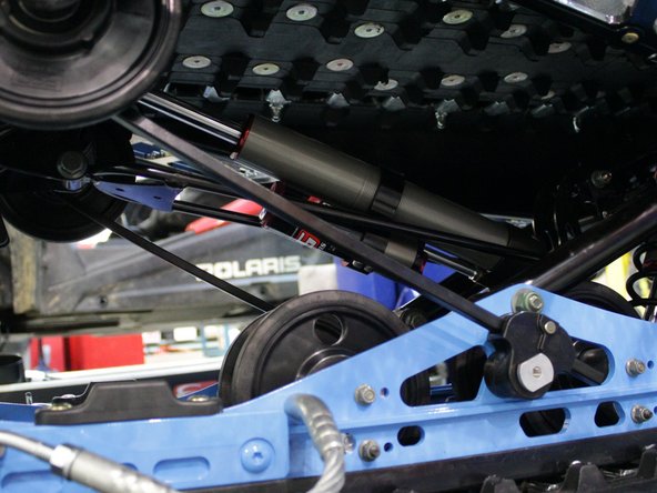 Re-install the two torsion spring.