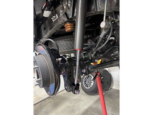 Torque upper and lower bolt.