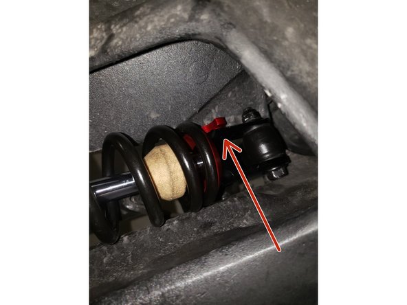 The rebound knob should be facing inwards as seen in the photo #2