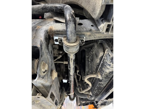 Reassemble the tie rod end, then torque the nut to factory spec