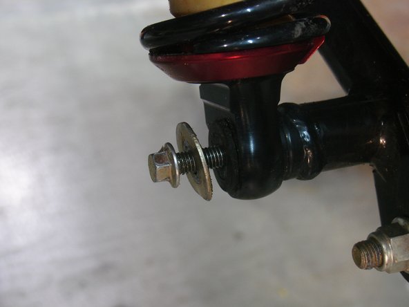Use the OEM steel spacer for lower mounting.