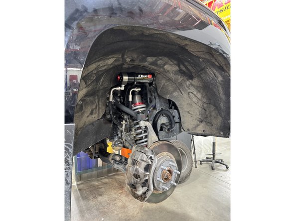 Reinstall the lower bolts and torque to factory spec