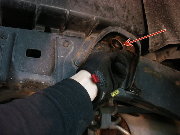 Remove  the rear oem shocks. BE SURE REMOVING OEM WASHER UNDER THE UPPER SHOCK MOUNTING as shown by red Arrow.