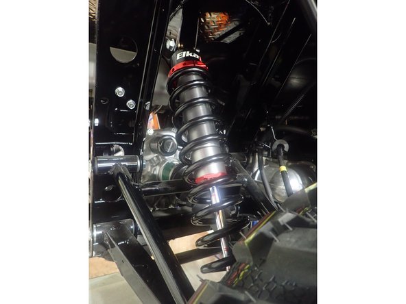 STAGE 1-2: Install the rear new Elka shocks with the head oriented upward.