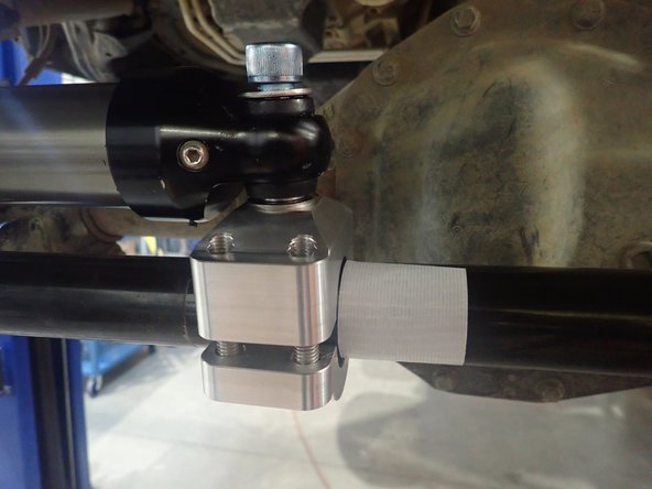 With the wheels turned completely to the left and the stabilizer in fully extended position: