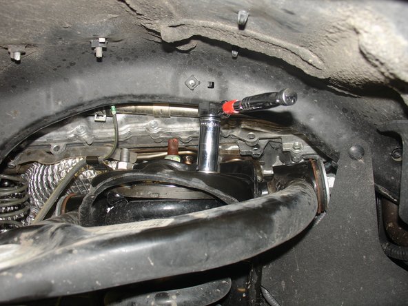 Remove the 4 nuts of upper shock mount. DO NOT REMOVE CENTRAL NUT.