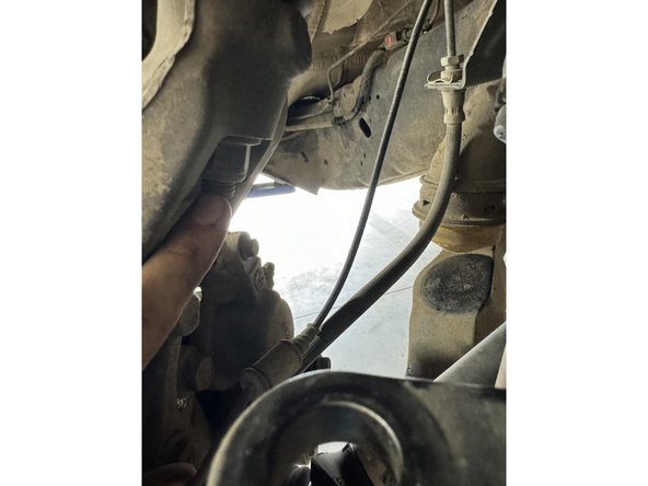 Remove upper arm ball joint nut and seperate it from steering knuckle.