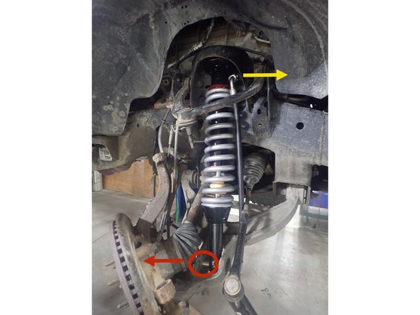 To install the Elka shocks, you have to use oem lower bolts and the provided upper bolts. Hoses must face the front of vehicle as shown by yellow arrow, and longer lower spacer must face the rear of vehicle as shown by red arrow. (right side shown).