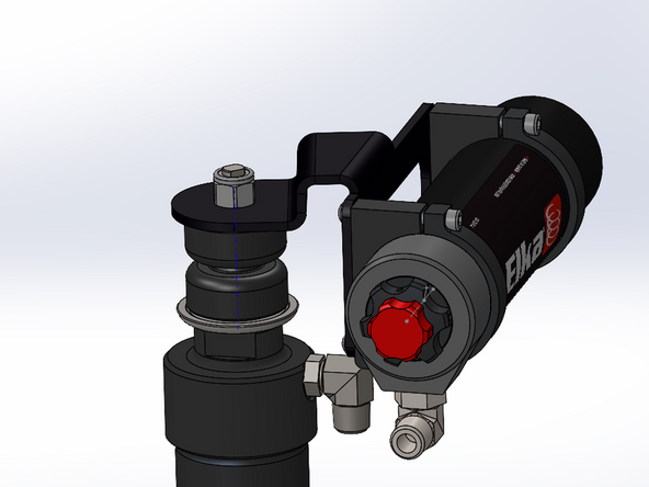 For models with an external reservoir, install the bracket as shown and tighten the nut.