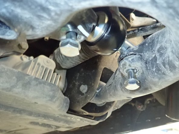 Be sure the lower mount's flats are facing lower arm as shown by blue circle. You can turn the lower pin if needed.