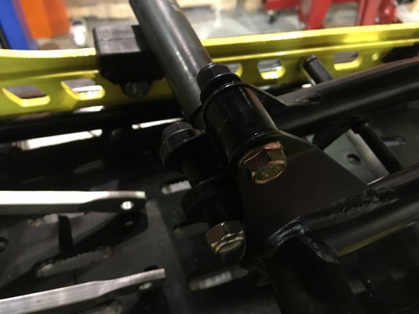 installed the elka linkage on the rear shock arm, use the stock shock bolt.