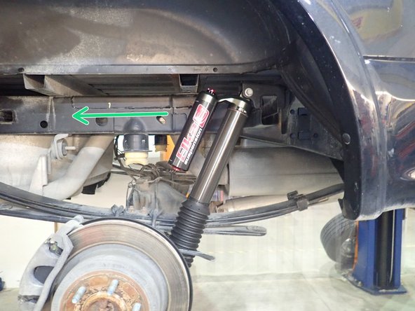 Both rear Elka shocks are the same, they must be installed with piggyback reservoir up. DRIVER'S SIDE reservoir must facing the REAR of vehicle as shown by red Arrow, and PASSENGER'S SIDE reservoir must facing REAR of vehicle as shown by green Arrow.