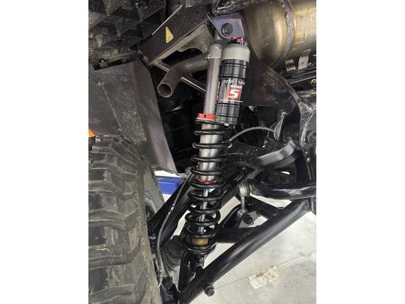 Install the IFP shock with the head upward.